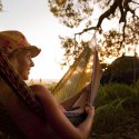 Camping-Young-Woman-in-Hammock